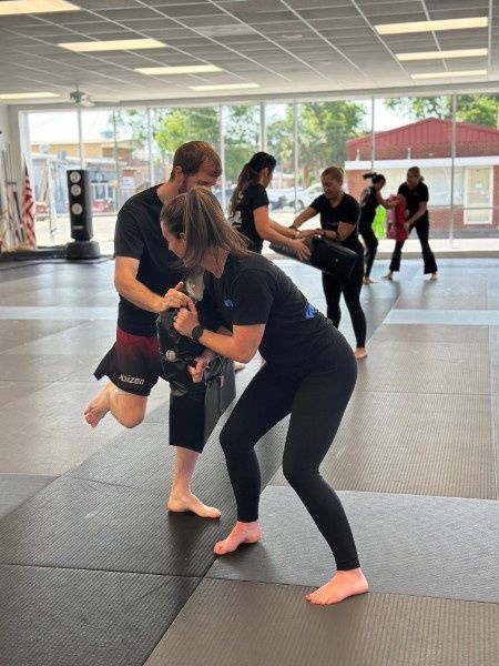 Young students practicing age-appropriate Krav Maga striking drills